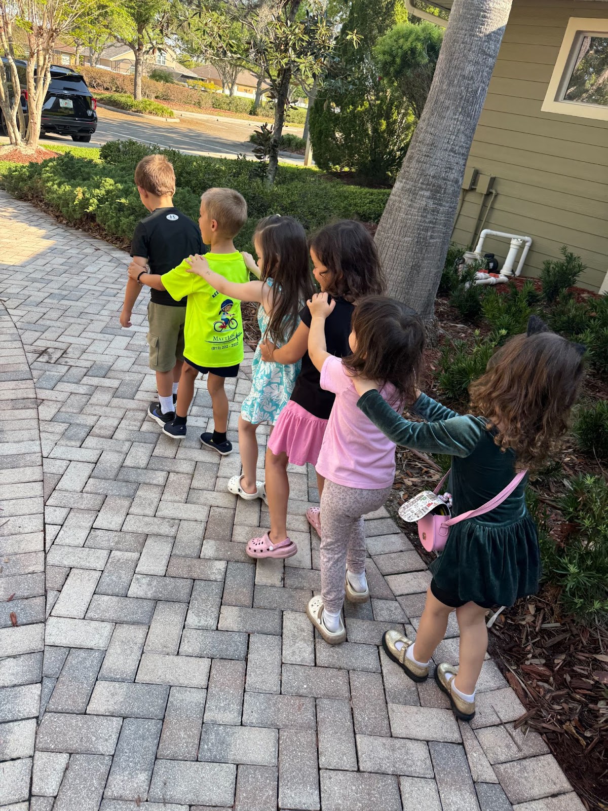 Students walking together outside during class time.